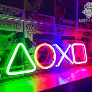 Juego de luces de neón en forma de gamepad Signos de neón para decoración  de pared PlayStation Lights Game Controller LED Neon Sign for Gaming Room  Man Cueva Party Decoración : 