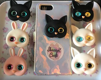 Air Pop sockets - Black Cat, White Cat  , White and pink Bunny phone grips. Large resin cat head with shiny eyes. Care Bears