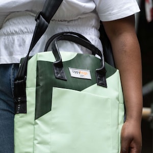 Carnaby st. upcycled bags, made of building banner from Carnaby st in London, sustainable and ethical bag UK. Every bag id different.