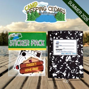 May include: A sticker pack in a clear plastic sleeve with a green header labeled STICKER PACK and a black and white composition notebook. The notebook has a white label with the text Ash, Josie's Bunk, 7, CAMP WEEPING CEDARS, WHO WROTE THIS?