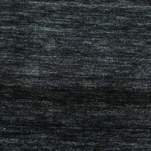 May include: A close-up of a dark gray textured fabric with a subtle sheen. The fabric has a slightly uneven surface, creating a subtle pattern.