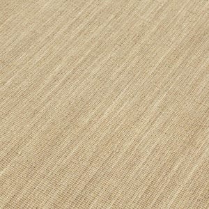 May include: Close-up of a beige woven rug with a subtle diagonal pattern. The texture of the rug is visible, showing the individual strands of the weave.