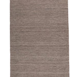 May include: A brown area rug with a subtle striped pattern and a white fringe border.