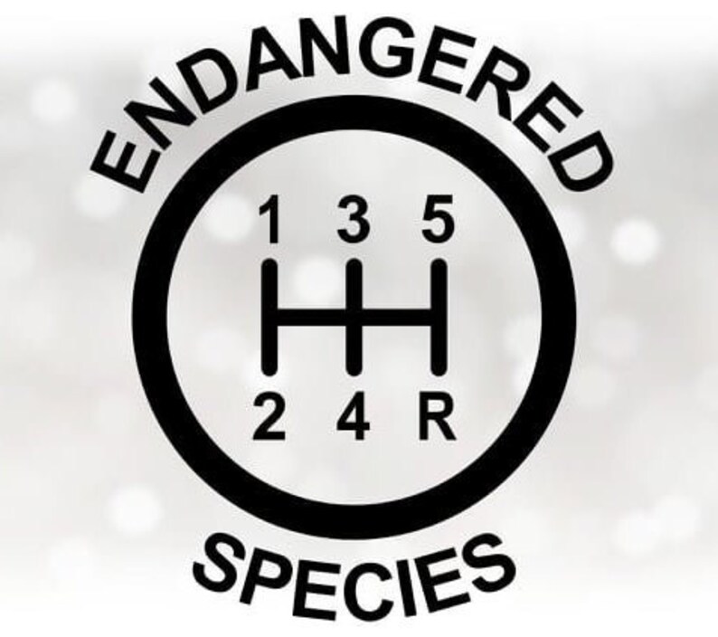 May include: A black and white graphic featuring a gear shift pattern inside a circle. The word "ENDANGERED" arcs above the circle, and "SPECIES" arcs below. The gear shift pattern includes numbers 1 through 5, and "R" for reverse.