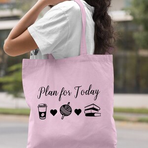 May include: Light pink tote bag with the text "Plan for Today" and black icons of a coffee cup, yarn, and books.