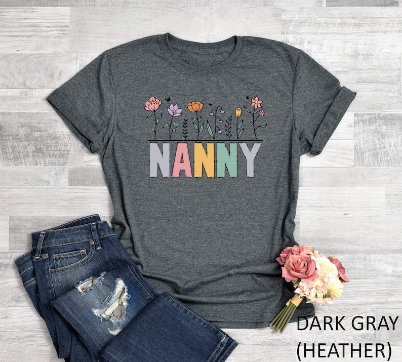 a t - shirt that says nanny with flowers on it