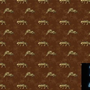May include: Brown patterned design featuring gold-colored leopards and floral elements. The repeating pattern creates a textured effect. The image includes the text "Scale Print And Design" in a neon blue font.