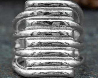 Wide silver ring for women, adjustable. Modern ring made of 925 silver with a line structure. Handmade statement ring made of sterling silver.