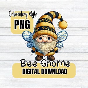 May include: Embroidery style PNG digital download of a bee gnome with yellow and black striped hat, blue wings, and a white beard. The gnome is standing on a wooden background.