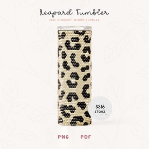 May include: A 20oz straight skinny tumbler with a leopard print design. The tumbler is covered in rhinestones and has a clear plastic lid. The text "SS16 STONES" is printed on a white circle sticker.