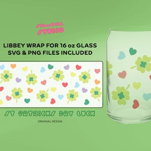 May include: A clear glass with a St. Patrick's Day design, featuring green shamrocks and colorful hearts. The design is also shown on a rectangular template. Text includes "Libbey Wrap for 16 oz Glass" and "St. Patricks Day Luck".
