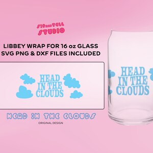 May include: Clear glass Libbey can-shaped glass with the phrase "Head in the Clouds" in light blue. The design includes light blue cloud graphics. The image also shows the text "Libbey Wrap for 16 oz Glass" and "SVG PNG & DXF Files Included".