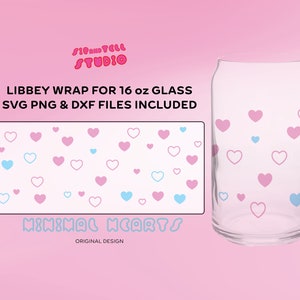 May include: A clear glass can-shaped cup with a scattered pattern of pink and light blue hearts. The design is labeled "Minimal Hearts" and is intended for a 16 oz glass. The image also includes the text "Libbey Wrap for 16 oz Glass SVG PNG & DXF Files Included."