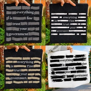 Puede incluir: Cuatro cojines cuadrados con el texto "everything is fine, trust your government." El texto está en una fuente desgastada, con un fondo negro y varias combinaciones de colores.
