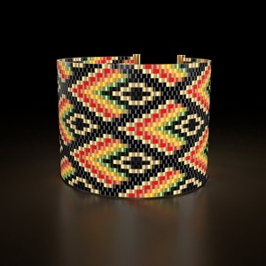 May include: A black, red, yellow, and green beaded bracelet with a geometric pattern.