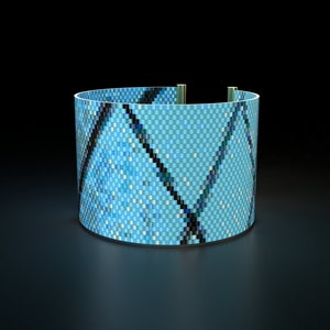Light Blue abstract peyote pattern of a flat cuff bracelet, a geometric style made from Miyuki Delica seed beads.