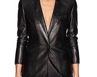 May include: A black leather blazer with a notched lapel, a single-button closure, and two front pockets. The sleeves are long and slightly gathered at the wrists. The blazer is a classic style.