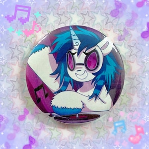 May include: A blue and white cartoon pony with a pink and purple background. The pony is wearing sunglasses and is holding a record player. The pony is smiling and has a happy expression.