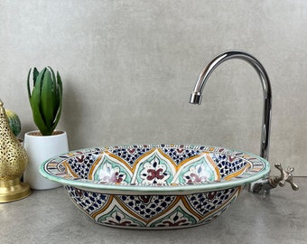 A Tapestry of Colors: Handpainted Moroccan Basin with Traditional Motifs - A Handcrafted Oval Ceramic Sink Adorned with Timeless Designs