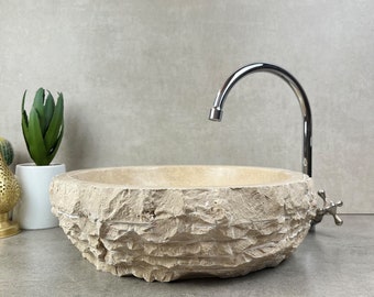 Basin Carved from Sahara's Volubilis Stone, Smoothed Interior Contrasted by Raw Exterior, Echoing the Untamed Beauty of the Moroccan Sands