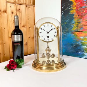 Antico orologio a pendolo a torsione Huber Monaco di Baviera circa 1910 – grande orologio anniversario Urania, oggetto da collezione vintage – con garanzia