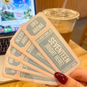 May include: A set of six pink and blue tickets for a Seventeen concert at UBS Arena in Belmont Park, NY. The tickets are dated 10.25&27.2024 and read "Seventeen Right Here".