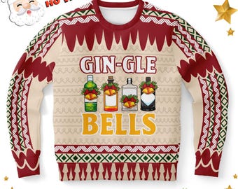 Op de afbeelding: Een beige sweatshirt met lange mouwen en een rood-witte patroonrand. De voorkant toont de tekst GIN-GLE BELLS boven vier geïllustreerde drankflessen, versierd met groene hulstbladeren en gouden bellen op een feestelijke achtergrond.
