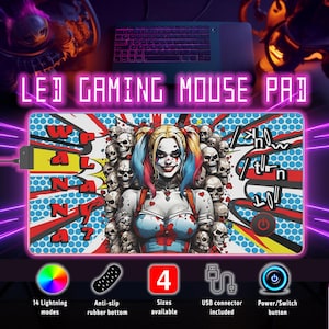 May include: LED gaming mouse pad with a colorful design featuring Harley Quinn and skulls. The pad has 14 lighting modes, an anti-slip rubber bottom, and a USB connector. It also has a power/switch button.