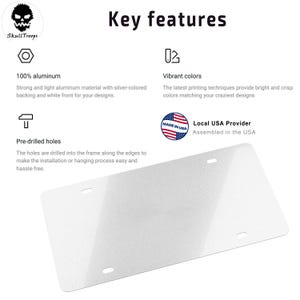 May include: A white license plate with pre-drilled holes, made of 100% aluminum. The plate has a silver-colored backing and a white front. The text "Key features" is at the top, with details about vibrant colors and being assembled in the USA.