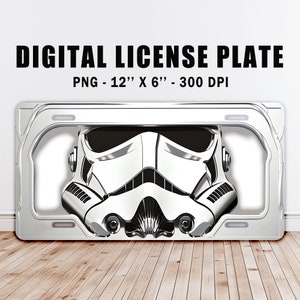 May include: A silver metal license plate frame with a white and black Stormtrooper helmet graphic. The frame is 12 inches by 6 inches and 300 DPI.