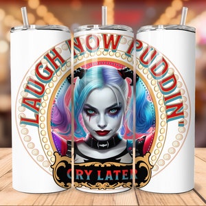 May include: White tumbler with a colorful illustration of Harley Quinn. The tumbler has a red, white, and gold design with the text "Laugh Now, Cry Later, Puddin'" around the image.