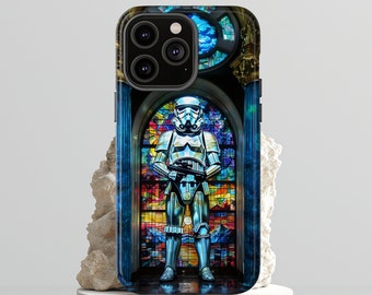 May include: A black iPhone case with a stained glass design featuring a Stormtrooper standing in a church window. The stained glass is colorful and includes shades of blue, red, yellow, and green.