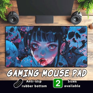May include: A blue and purple gaming mouse pad featuring a skull and an anime girl with red eyes and blood dripping from her mouth. The mouse pad has a non-slip rubber bottom and is available in two sizes. "Gaming Mouse Pad" is written in white text at the bottom of the image.