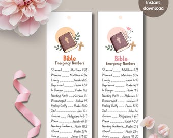 May include: Two white bookmarks with the text "Bible Emergency Numbers" and a list of Bible verses for various emotional states. Each bookmark features a small illustration of a book and cross.