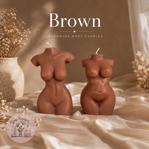 May include: Two brown torso-shaped candles with white wicks. The text "Brown" and "HANDMADE BODY CANDLES" is visible at the top. The candles feature a smooth, matte finish and represent the human form from the shoulders to the upper thighs.