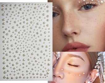 May include: A sheet of white pearl stickers with various sizes of pearls. The pearls are arranged in rows and columns on a white background. The sheet is shown next to two images of people with the pearl stickers applied to their faces.
