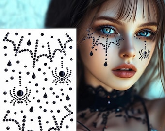 May include: A sheet of black adhesive face gems featuring spider, web, and teardrop designs. The individual rhinestones are arranged in patterns to be applied to the skin, creating a decorative look with dark, glossy, circular and drop-shaped accents.