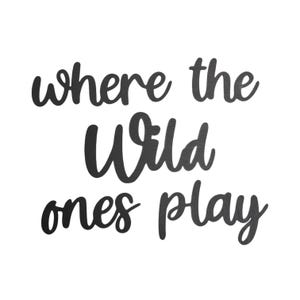 May include: Black script text on a white background reads "where the Wild ones play." The phrase is in a cursive font, perfect for wall decor or a nursery. The words are in a bold, dark color.