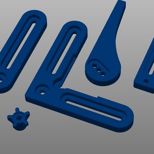 May include: A set of five blue plastic woodworking tools, including a corner clamp, a ruler, a handle, and two small pieces. The tools are designed for woodworking projects.