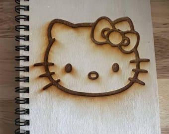 Cuaderno de bocetos de madera grabado de Hello Kitty: diario encuadernado en espiral