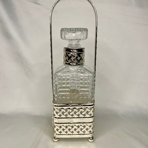 Vintage Crystal glass decanter with silver plated carrier