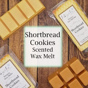 May include: A set of three wax melt bars in a shortbread cookie scent. The wax melts are packaged in clear plastic containers with a label that reads "Shortbread Cookies Scented Wax Melt".