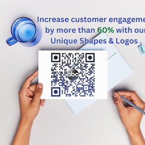 May include: A white card with a black and white QR code and the text "Increase customer engagement by more than 60% with our Unique Shapes & Logos." The QR code has a black circle in the center with the letters "abc" in white.