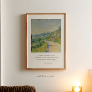 Könnte beinhalten: Ein gerahmter Druck mit einem Gemälde einer kurvigen Straße, die durch eine grüne Landschaft führt. Der Druck enthält den Text "Lehre mich deinen Weg, Herr, damit ich in deiner Wahrheit wandele; vereine mein Herz, deinen Namen zu fürchten. Psalm 86:11" und die Signatur "ArtStudioHesed".