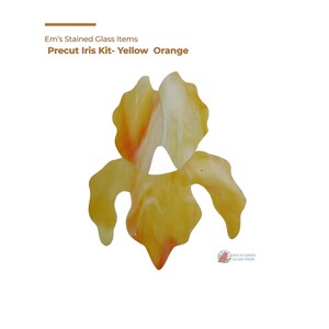 May include: Precut iris kit in yellow and orange stained glass. The flower-shaped pieces are designed for crafting. The image includes text that reads "Em's Stained Glass Items" and "Precut Iris Kit- Yellow Orange."