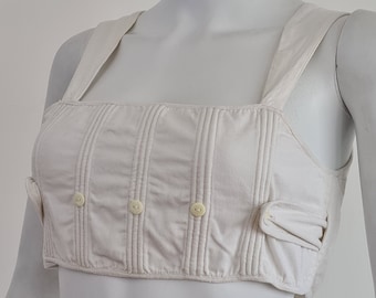 Martin Margiela rare documented S/S 1995 replica of a white cotton baby’s buttoned vest from the turn of the century – 90s fashion