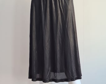 Margiela F/W 1995 black skirt in a shiny fabric - 90s fashion