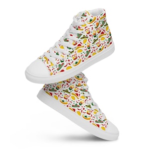 May include: White high-top sneakers with a colorful pattern of Mexican food and hats. The pattern includes red chili peppers, yellow tacos, and green sombreros.