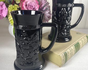 Vintage 70s Black Glass Beer Stein Mugs Set of 2 Embossed Tavern Scene Tankards 5.75 Inch Tall Academia