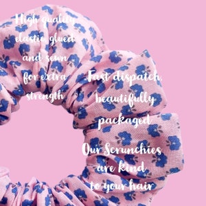 May include: A pink and blue floral scrunchie with the text "High quality elastic glued and sewn for extra strength. Fast dispatch, beautifully packaged. Our Scrunchies are kind to your hair."